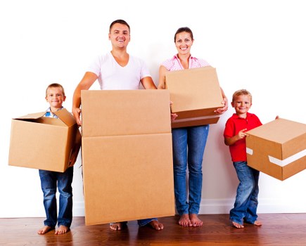 Moving van and packed boxes for a home move in Haringey