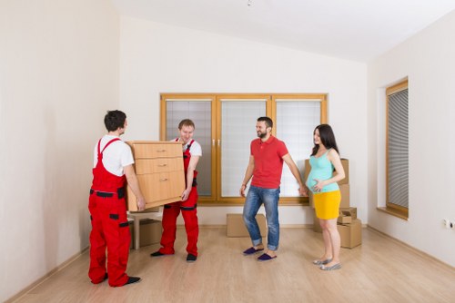 Apartment move in Haringey with careful handling of boxes and furniture