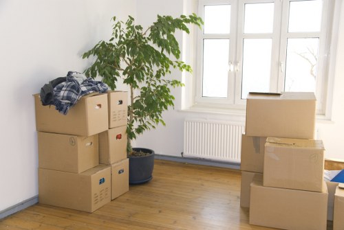House movers working in a flat with stairs in Haringey