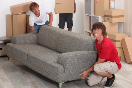 Careful furniture loading by a local moving team in Haringey