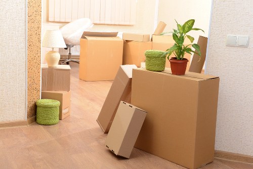 Careful wrapping of fragile household items during a local move