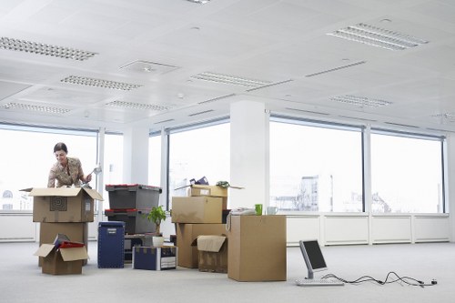 Local moving team handling furniture in a Haringey street