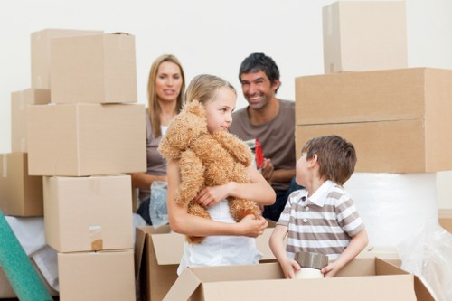 Packed office boxes and furniture ready for a commercial move